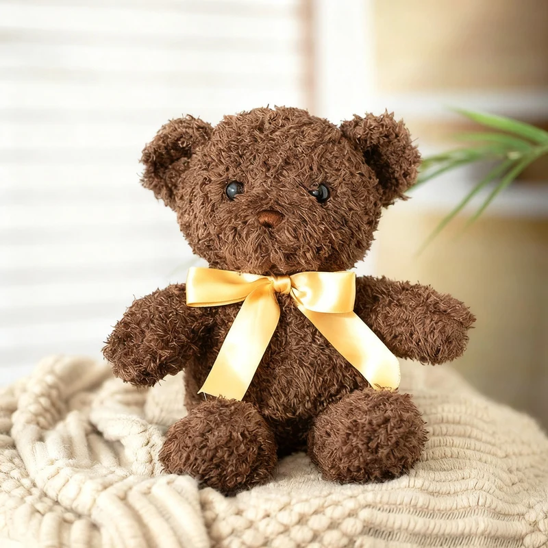 Plush teddy bear with bow, 25–30 cm