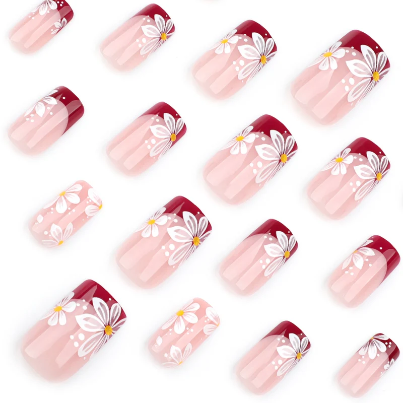 Kunstvolle Nagelverlängerungen mit Blumenmotiv Karnz