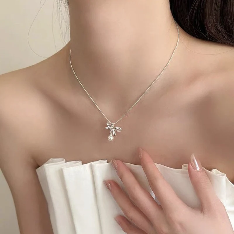Pearl necklace with silver clasp, pearls 4–12 mm