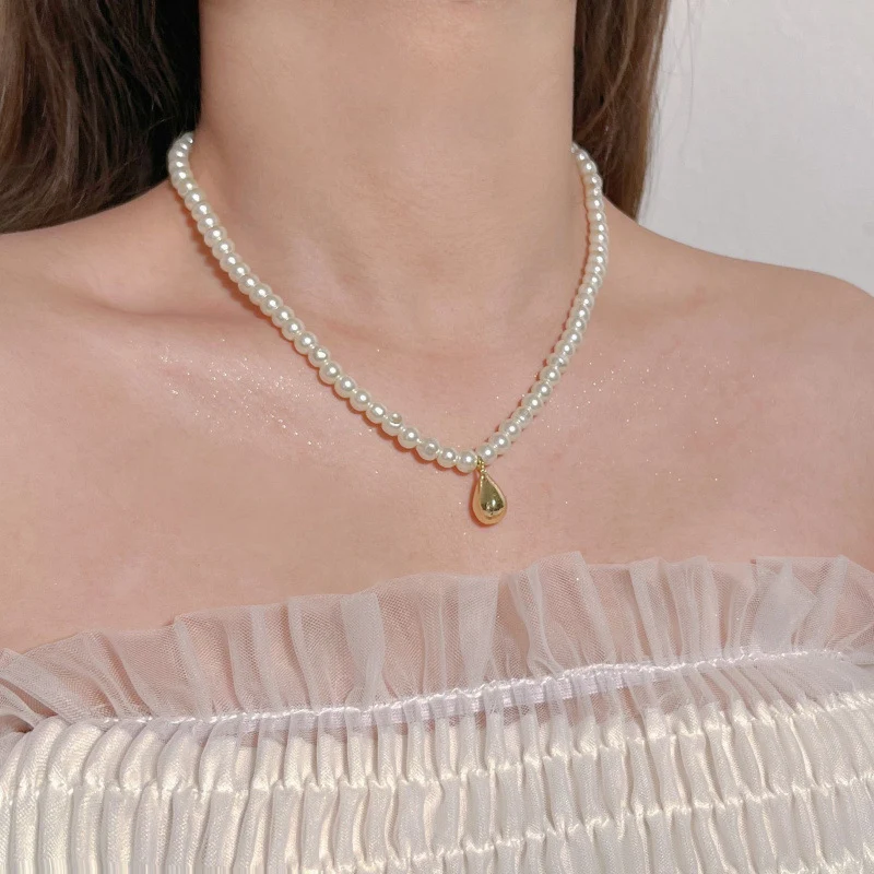 Pearl necklace with silver clasp, pearls 4–12 mm