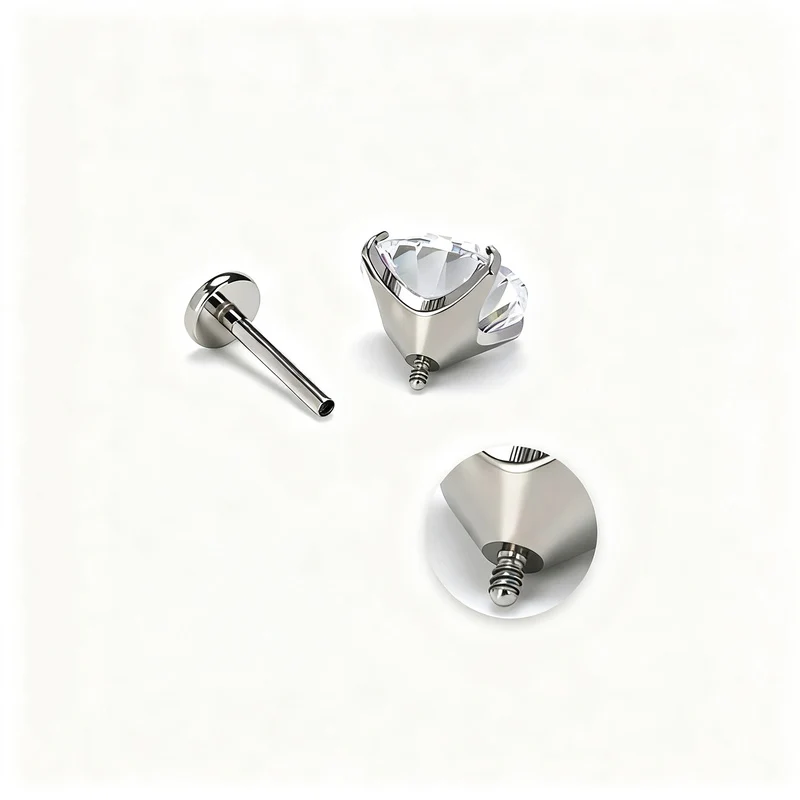 Titanium alloy earrings with zirconia, screw closure