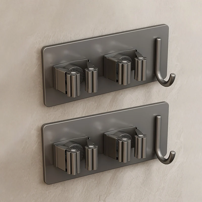 Stainless steel holder for mop and broom
