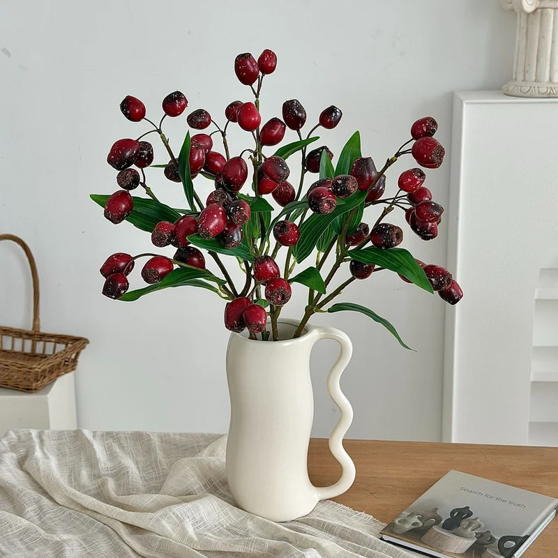 Artificial branch with olives