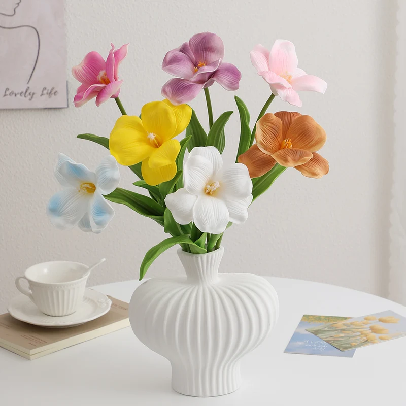 Artificial orchid flower branch with realistic details