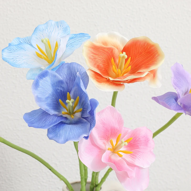 Artificial orchid flower branch with intricately detailed flowers
