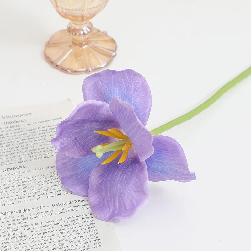 Artificial orchid flower branch with intricately detailed flowers