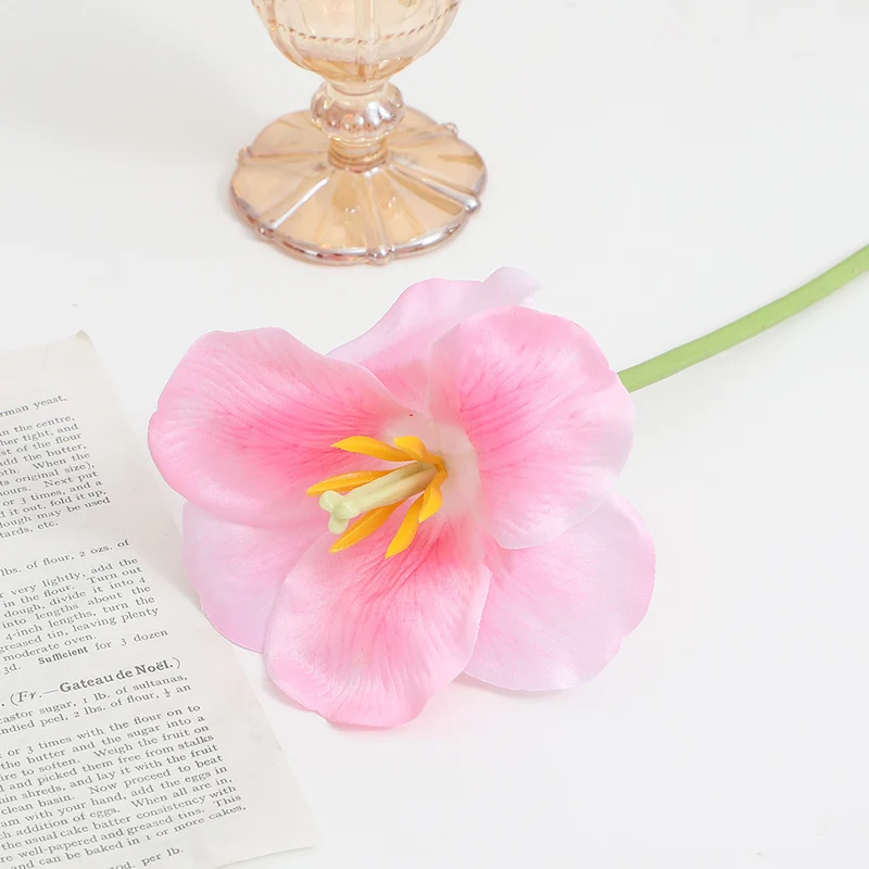 Artificial orchid flower branch with intricately detailed flowers