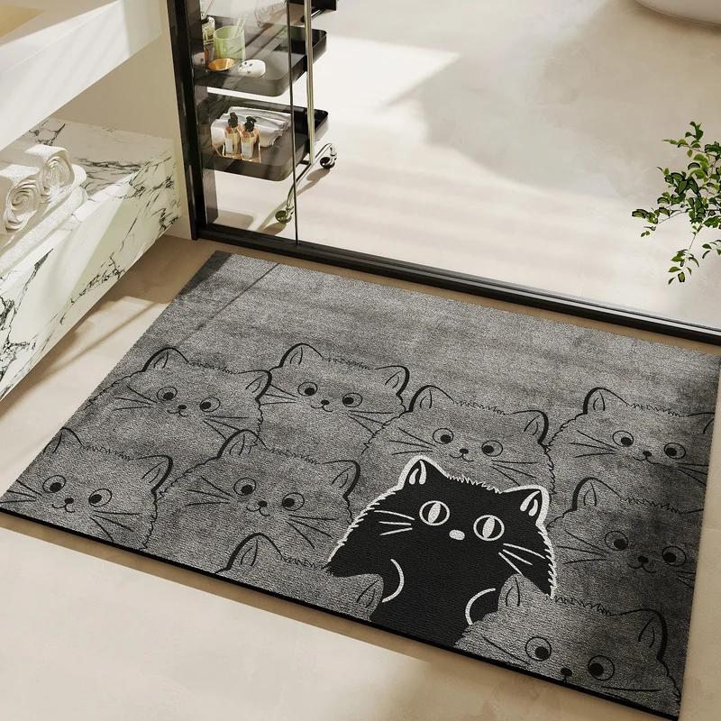 Niedlicher katzenmotivierter Badteppich