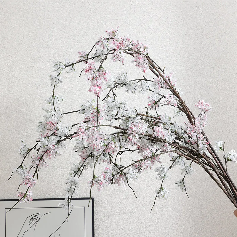 Artificial cherry blossom branch with lifelike details
