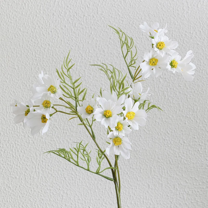 Artificial flower branch with bright pink flowers