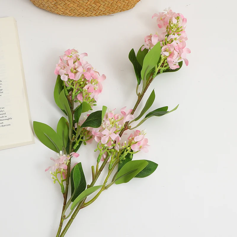 Artificial flower branch with bright flowers