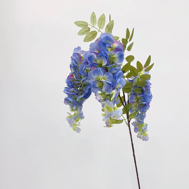 Artificial flower branch with lifelike, hanging flowers