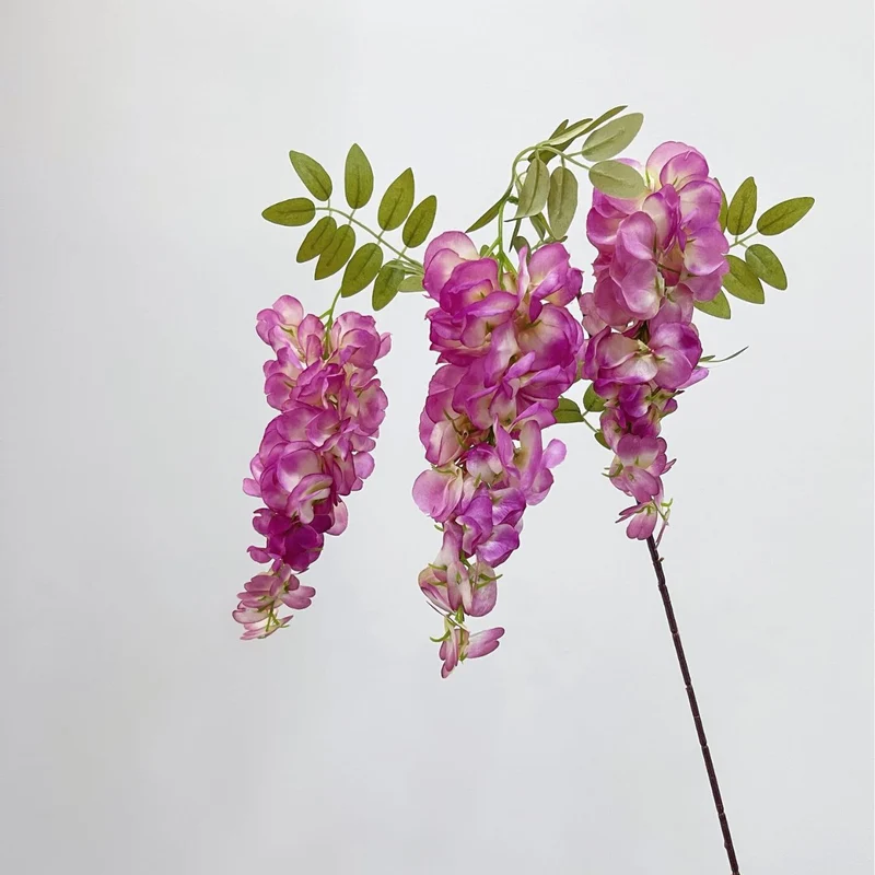 Artificial flower branch with lifelike, hanging flowers