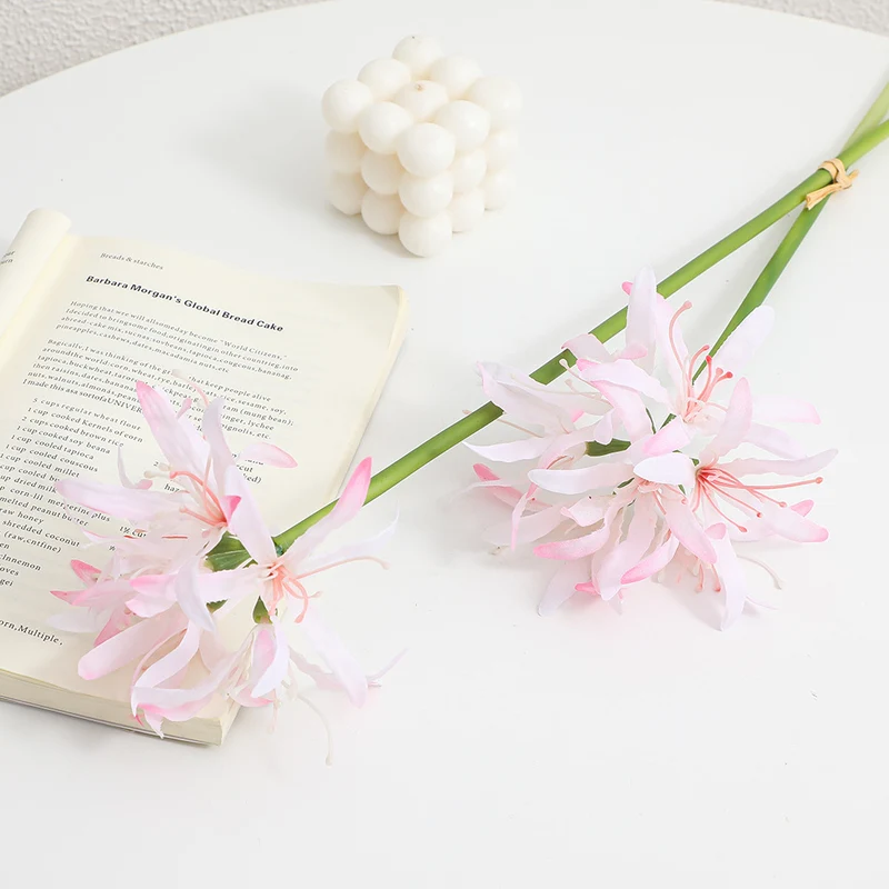 Artificial blossom branch with delicate flowers