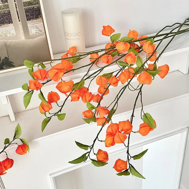 Artificial flower branch with fine, vibrant flowers and natural look