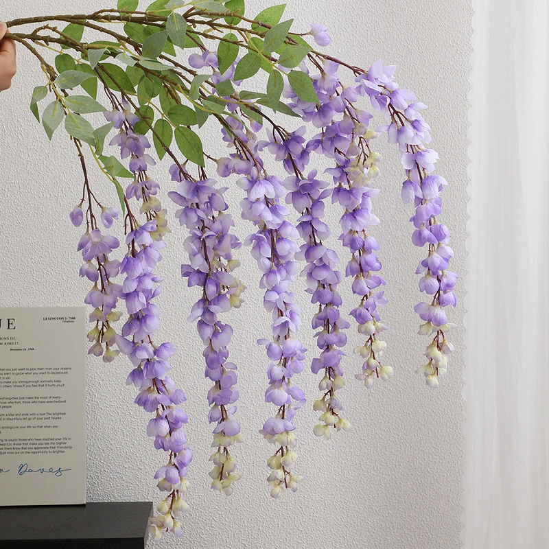 Artificial flower branch with elegant flowers