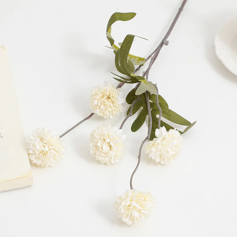 Artificial flower branch with intricate flowers
