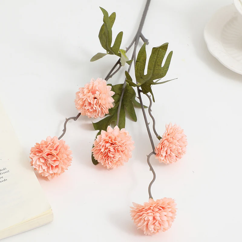 Artificial flower branch with intricate flowers