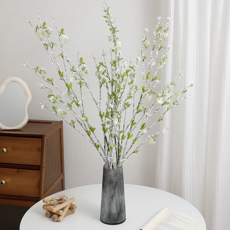 Artificial flower branch with detailed flowers