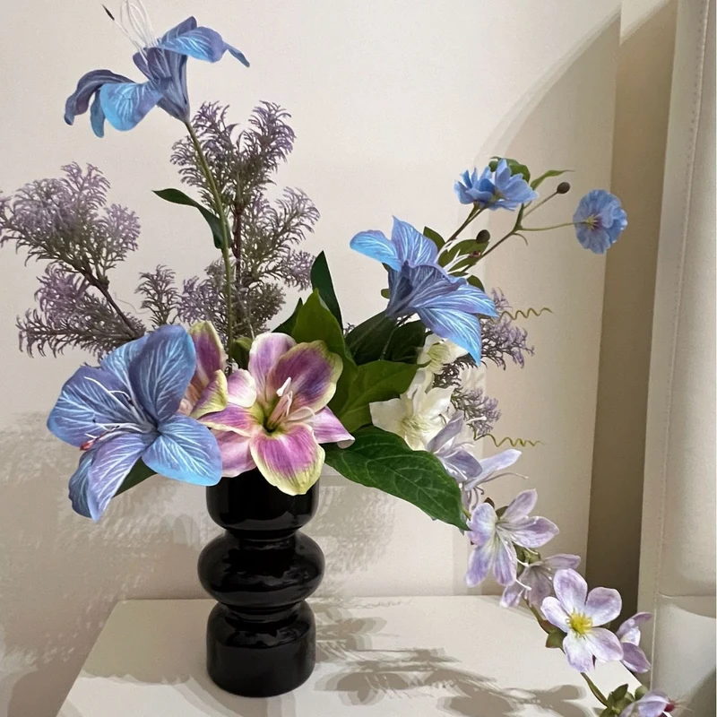 Artificial flower bouquet with fine, realistic blooms