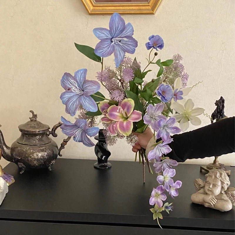 Artificial flower bouquet with fine, realistic blooms