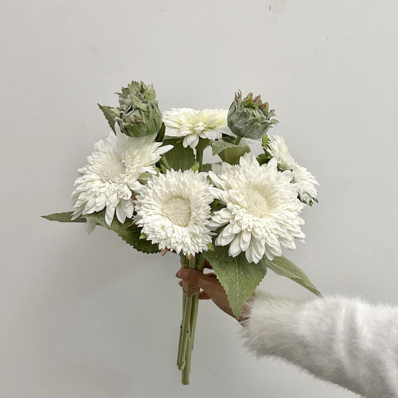 Artificial bouquet with detail-loving flowers and leaves