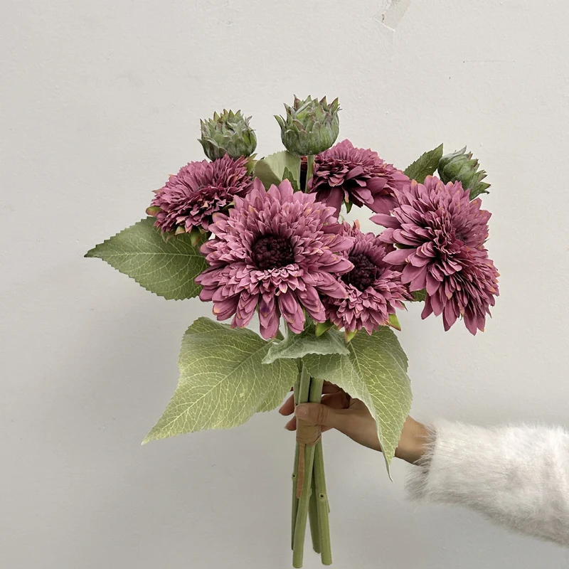 Artificial bouquet with detail-loving flowers and leaves