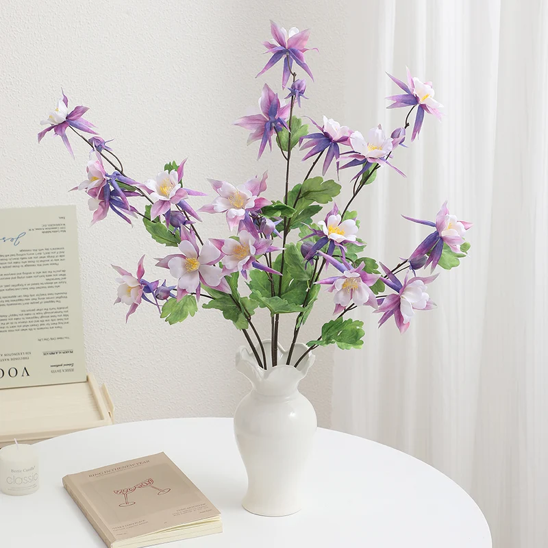 Artificial bouquet with intricate flowers and leaves