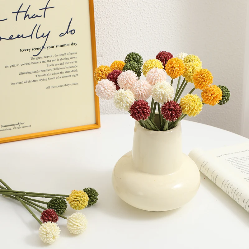 Artificial flower stem with detailed blooms