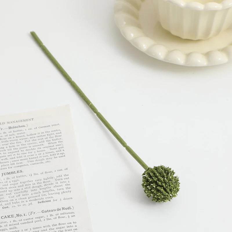 Artificial flower stem with detailed blooms