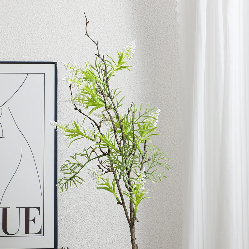 Artificial plant with decorative flowers