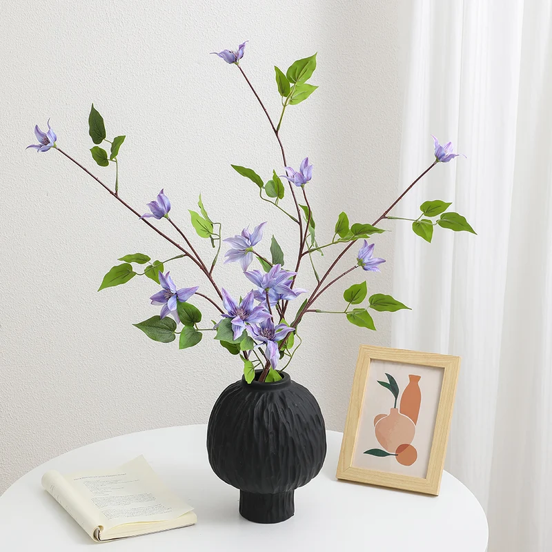 Artificial flower branch with lifelike fig tree leaves