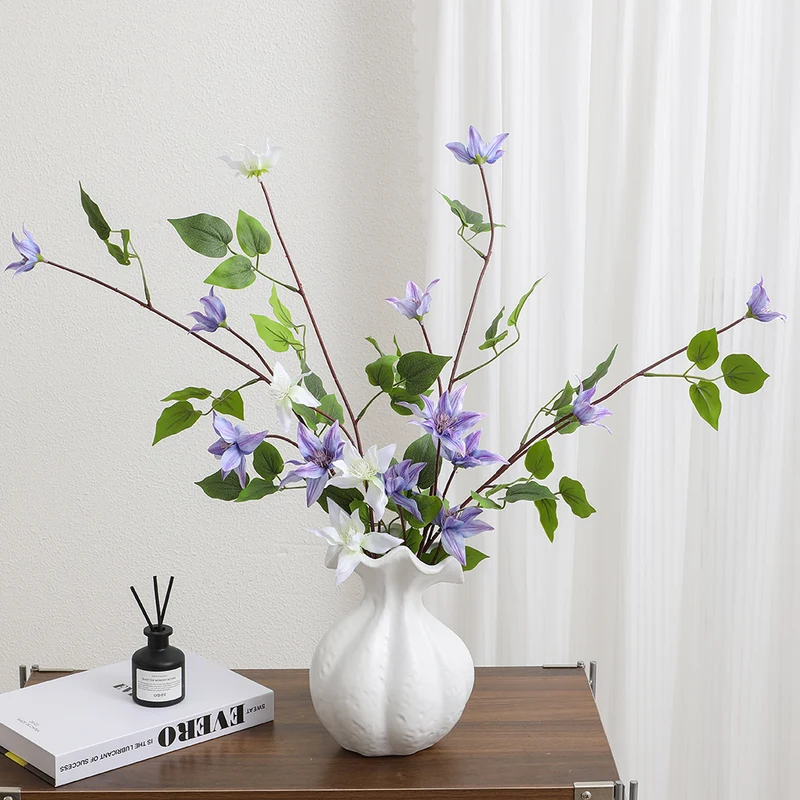 Artificial flower branch with lifelike fig tree leaves