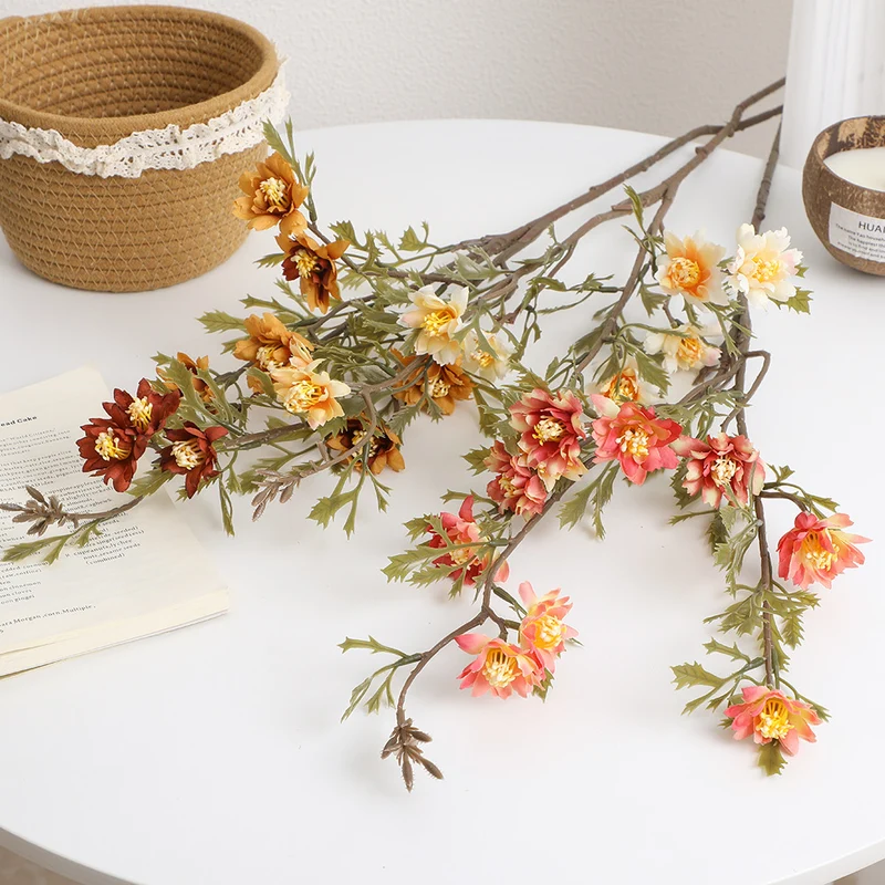 Elegant artificial flower branch with detail-loving blossoms