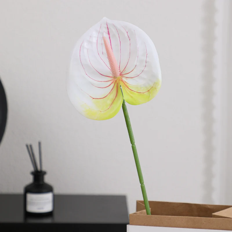 Elegant artificial orchid with delicate flowers