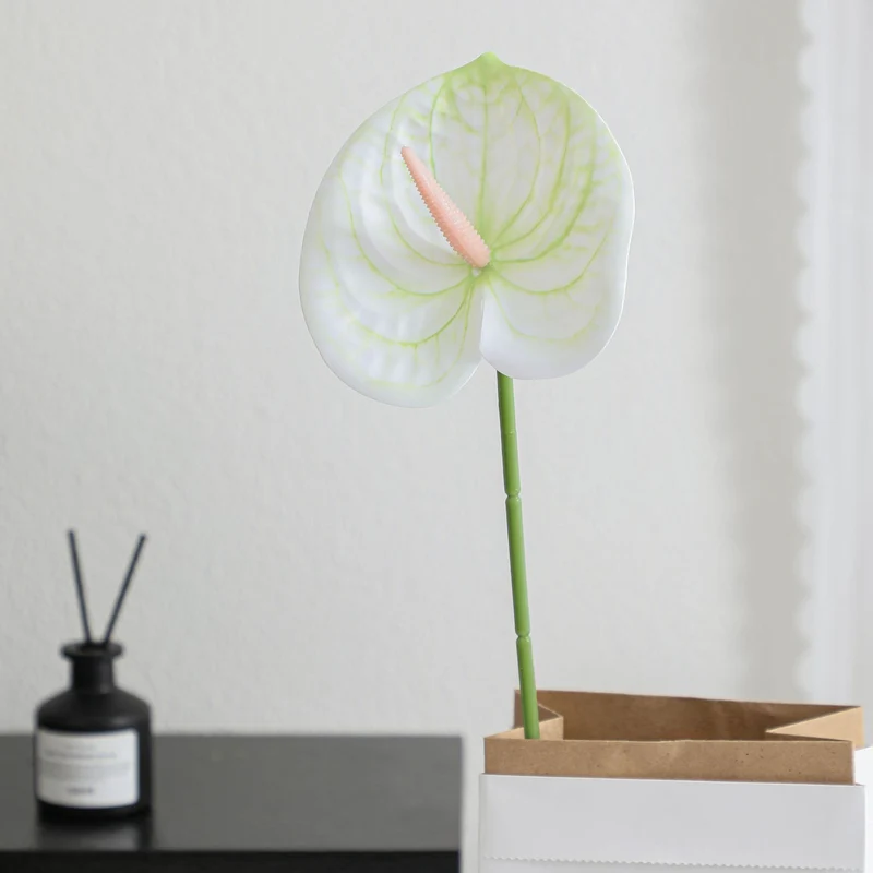 Elegant artificial orchid with delicate flowers