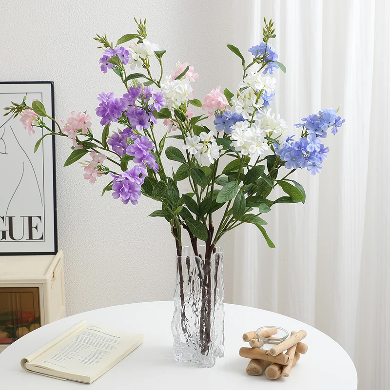 Decorative art branch with white flowers
