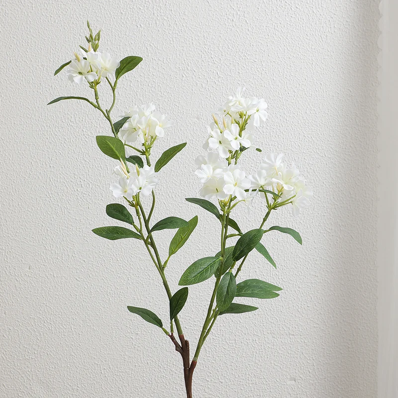 Decorative art branch with white flowers