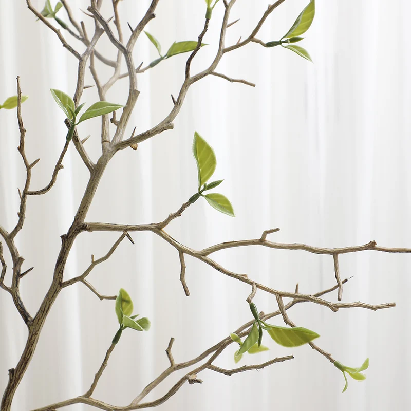 Decorative art branch with natural leaves