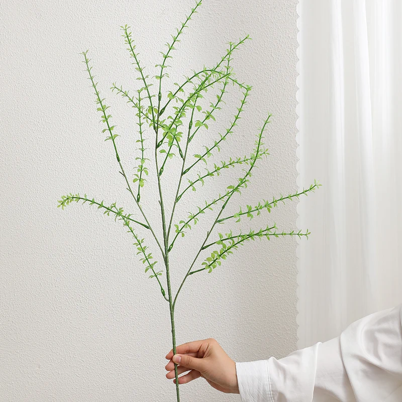 Decorative artificial branch with filigree, curved twigs