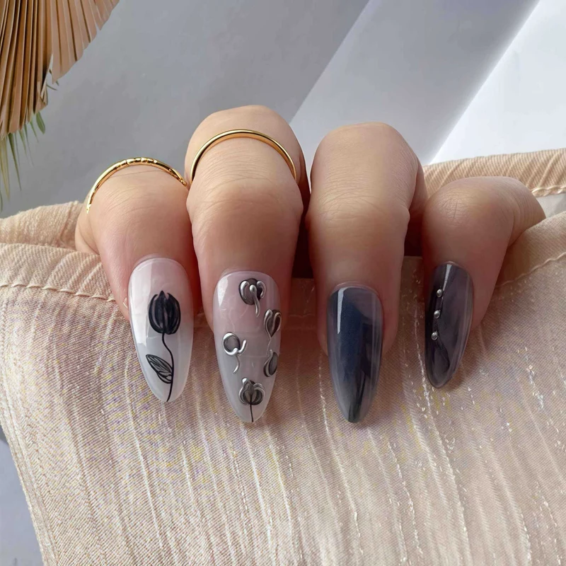 Künstlerisches Stiletto Press-On Nageldesign Karnz