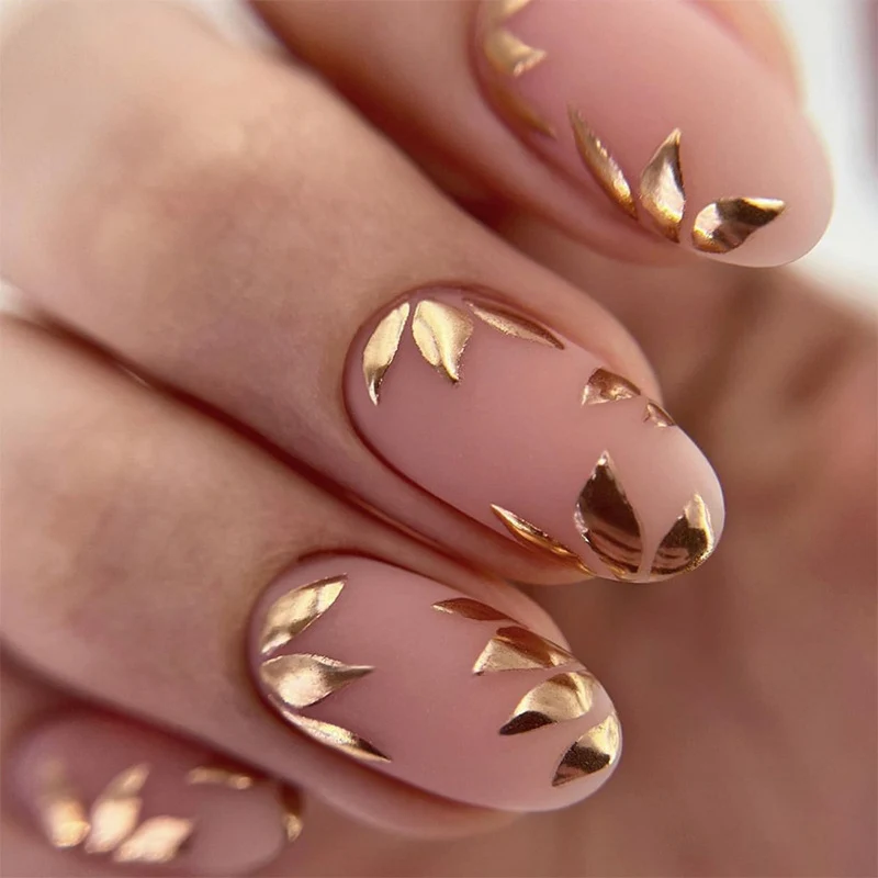 Elegant Metallic Leaf Nail Art Stornfield