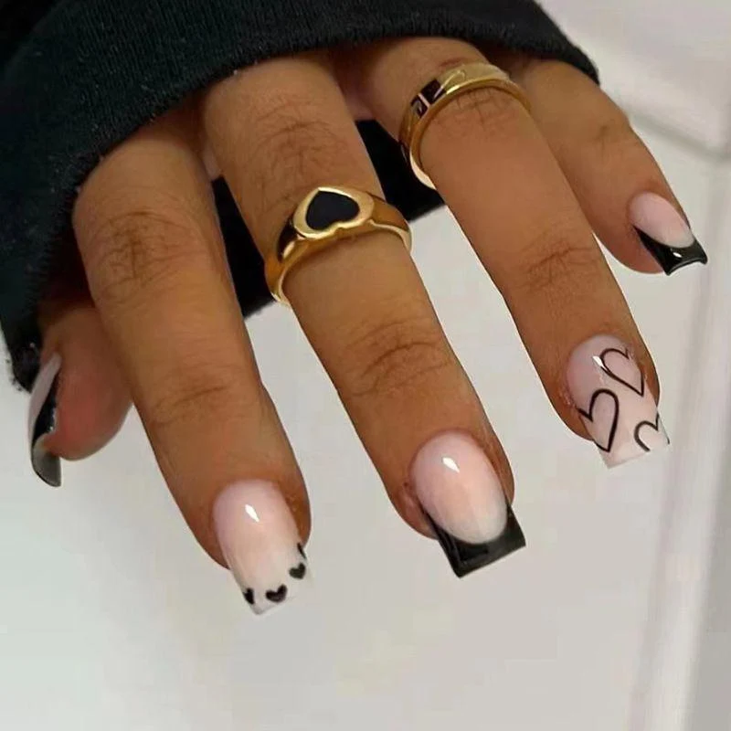 Elegant Heart-Embellished Nail Art Design Stornfield