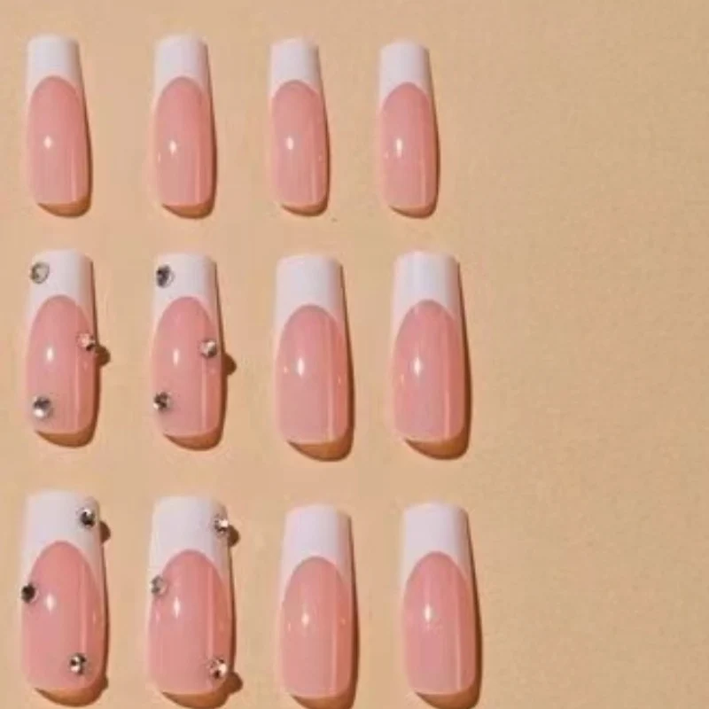 Elegant Glitter-Embellished French Tip Acrylic Nails Stornfield