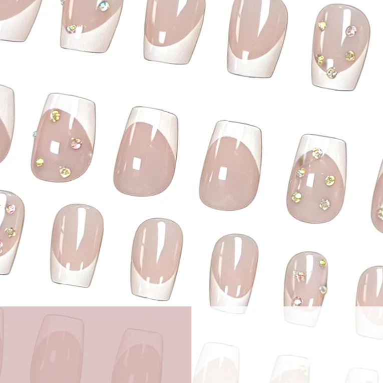 Elegant French Tip Nail Art Enhancements with Gem Accents Stornfield