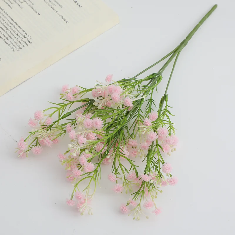 Decorative artificial flower branch with delicate purple flowers