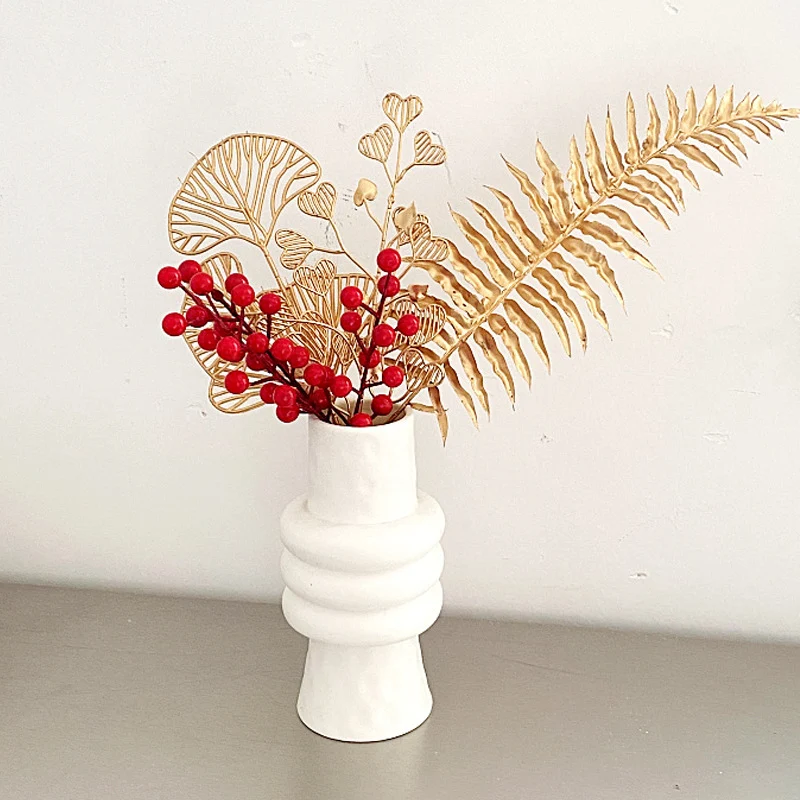 Decorative artificial flower branch with delicate details