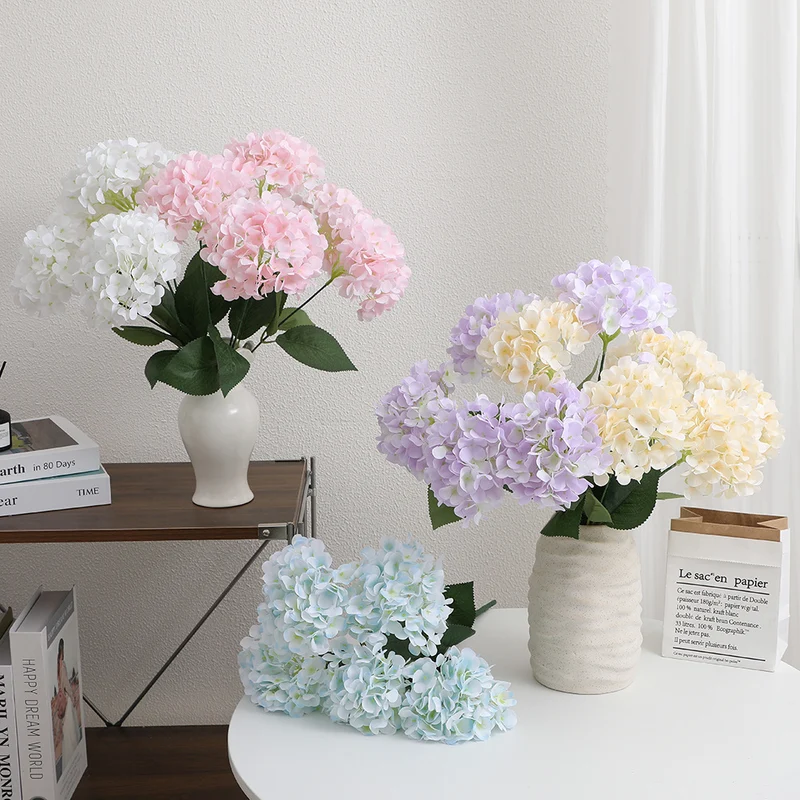 Decorative artificial flower arrangement