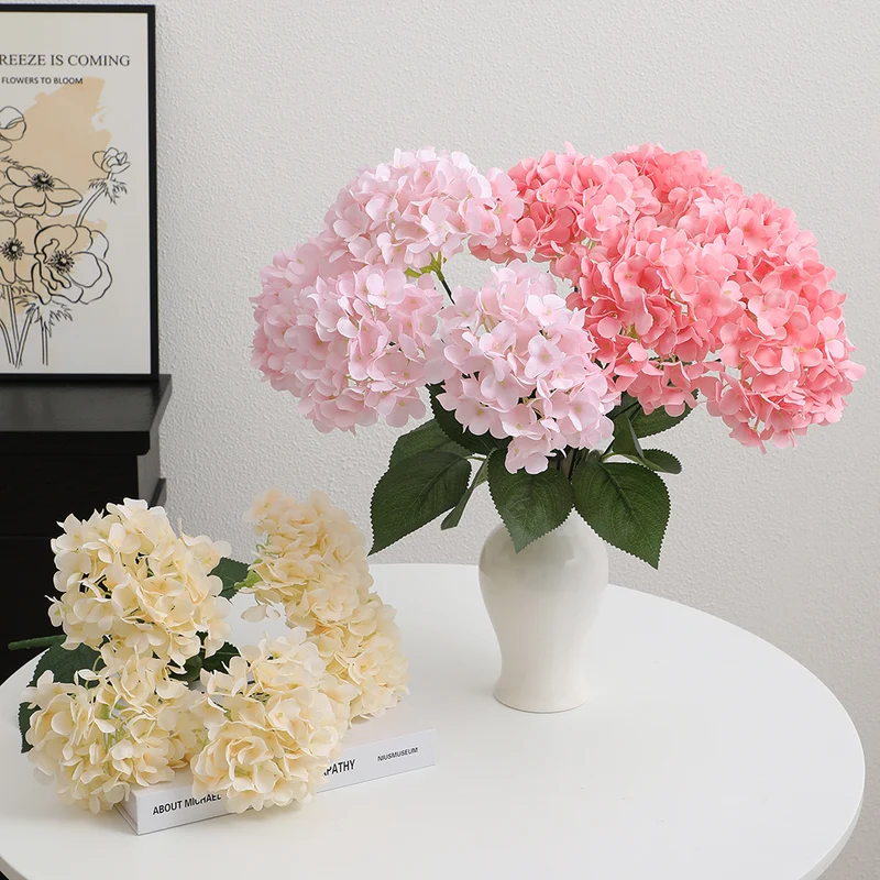 Decorative artificial flower arrangement
