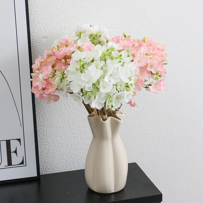 Artificial flower bouquet with delicate blooms